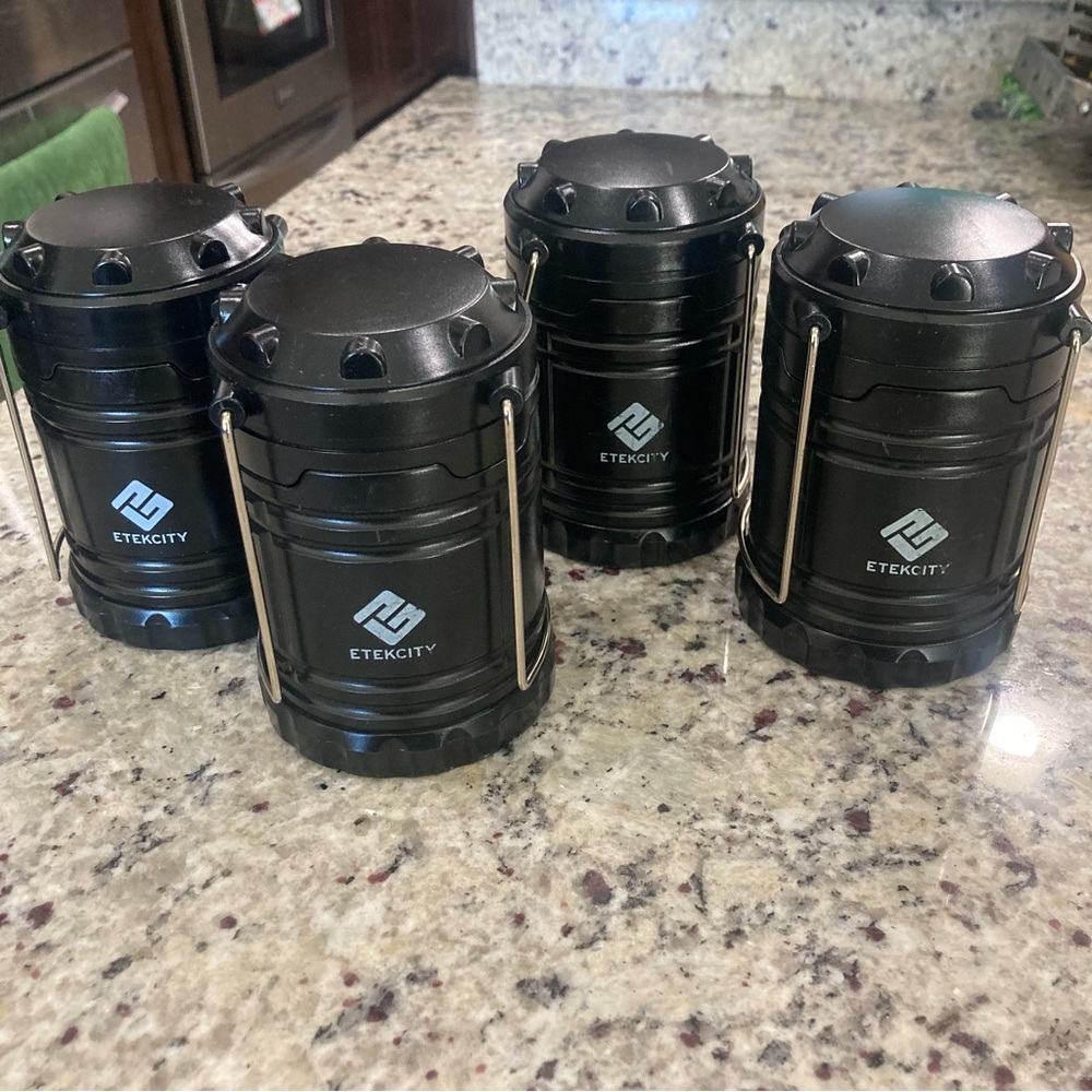 Set of 4 Etekcity black LED travel/camping lanterns Preowned  **No Batteries**